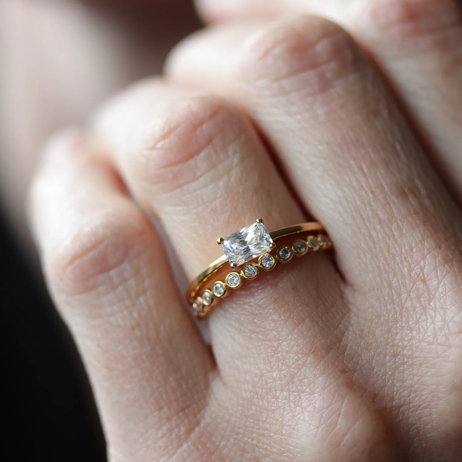Emerald Cut East-West Basket Solitaire Engagement Ring